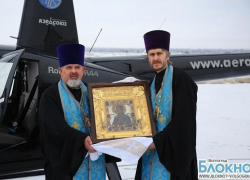 Икона Пресвятой Богородицы облетела Волгоград на вертолете Икона Пресвятой Богородицы облетела Волгоград на вертолете