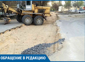 Рабочие засыпали дорогу у школы опасным шлаком, - волгоградка Рабочие засыпали дорогу у школы опасным шлаком, - волгоградка